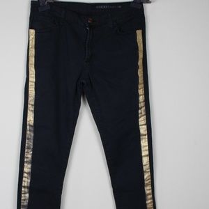 RockstarBlack Golden Side Striped Skinny jeans.